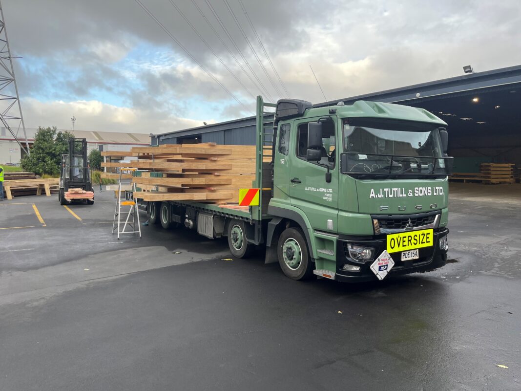 10 Metre Flat deck truck with an oversize load on.